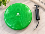 Bright green SkillSprouts OT sensory balance cushion with textured surface and included hand inflation pump.