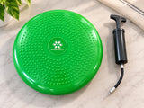 Bright green SkillSprouts OT sensory balance cushion with textured surface and included hand inflation pump.